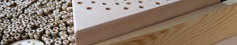 Nahmaufnahme Dübel und Holzstücke aus unserer Tischlerei